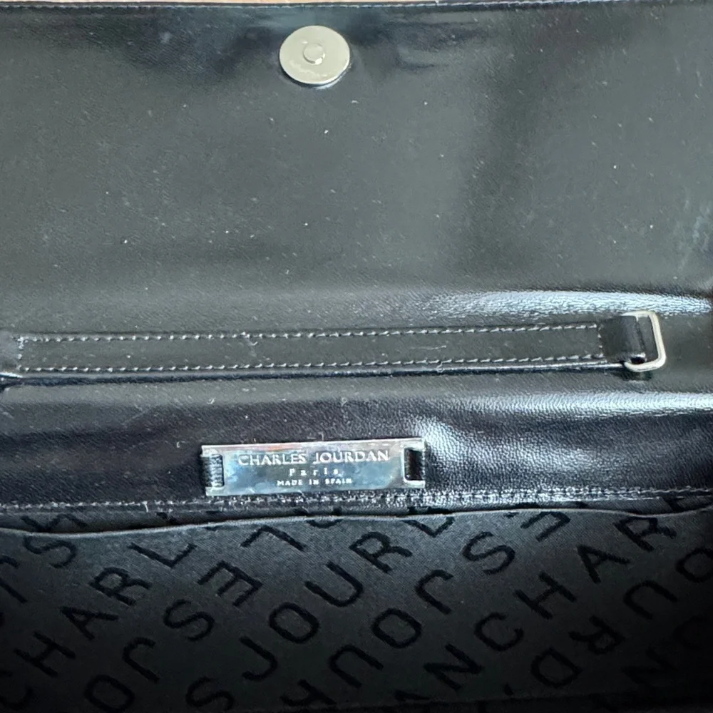 Vintage Charles Jordan genuine leather clutch with geometric design